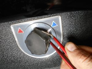 29. Dépose bouton caoutchouc