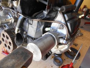 13. Fitting the camshaft front seal.