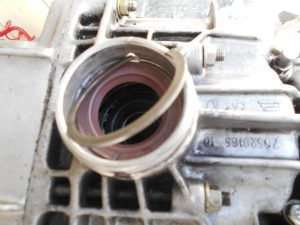 32. Refitting a shaft seal retaining ring.