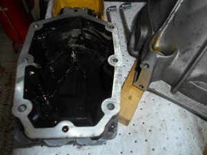 36. Resealing the rear gearbox cover.